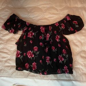 Angie (Ron Jon Brand) black floral off the shoulder crop top